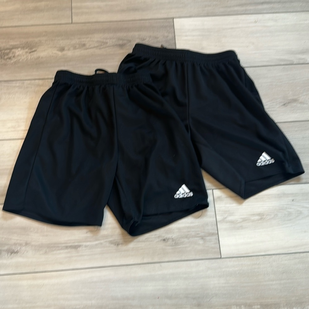 2 pairs of Adidas youth soccer shorts. Size medium